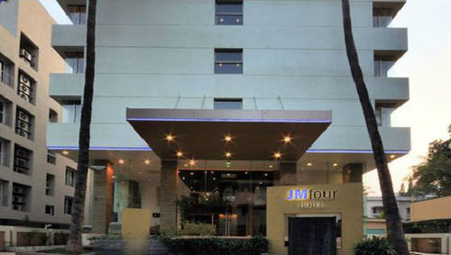 Jm Four Hotel Пуна Экстерьер фото